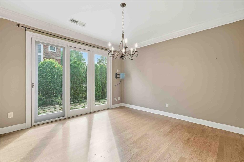 4055 Hill House Road Southwest Smyrna, GA 30082 - Photo 9 of 50 a view of a livingroom with a large window and chandelier
