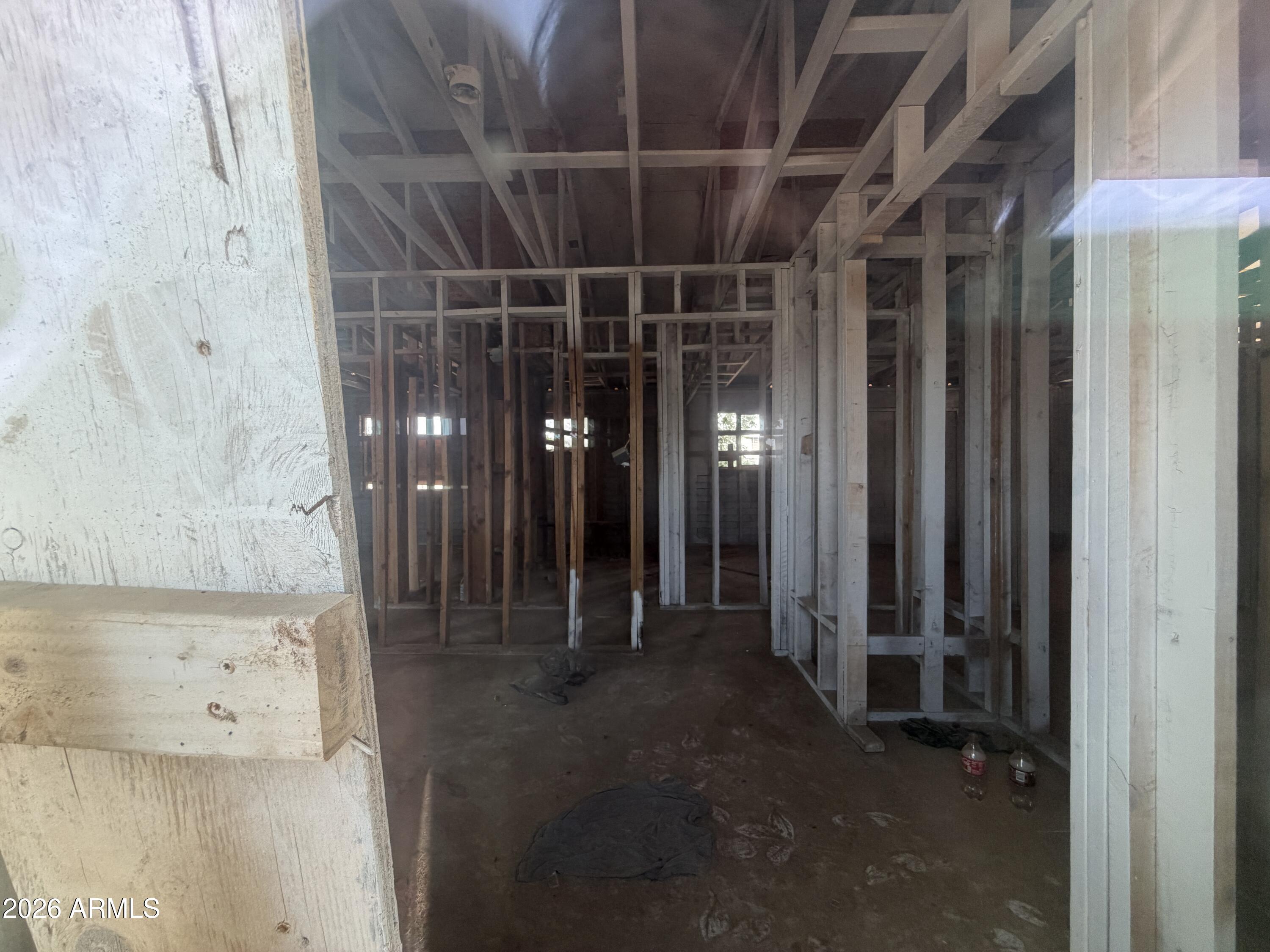 231 West Rhodes Avenue Avondale, AZ 85323 - Photo 7 of 7 a view of a room with wooden walls