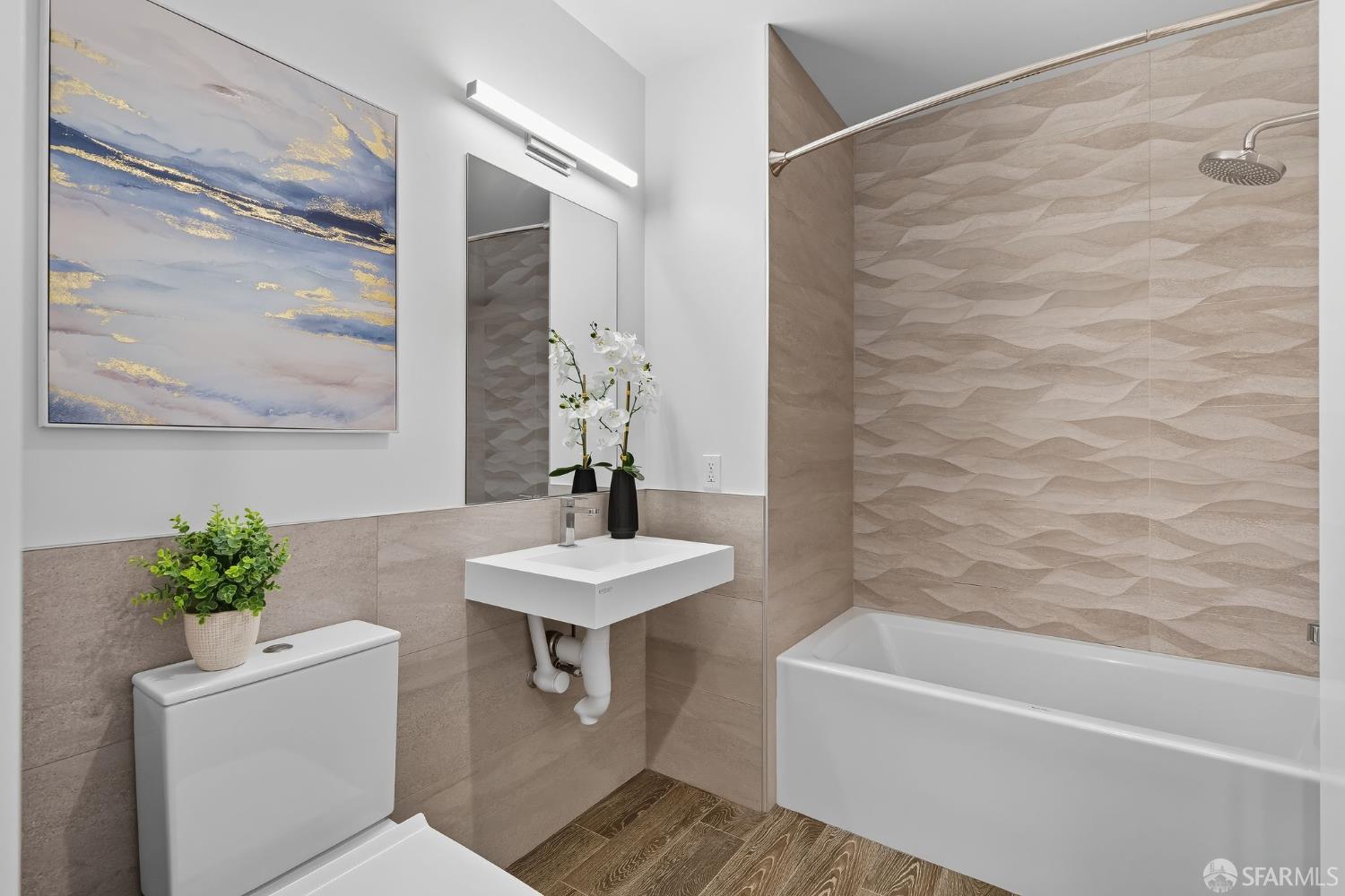 2747 San Pablo Avenue, Unit 406 Berkeley, CA 94702 - Photo 14 of 34 a bathroom with a sink and a mirror