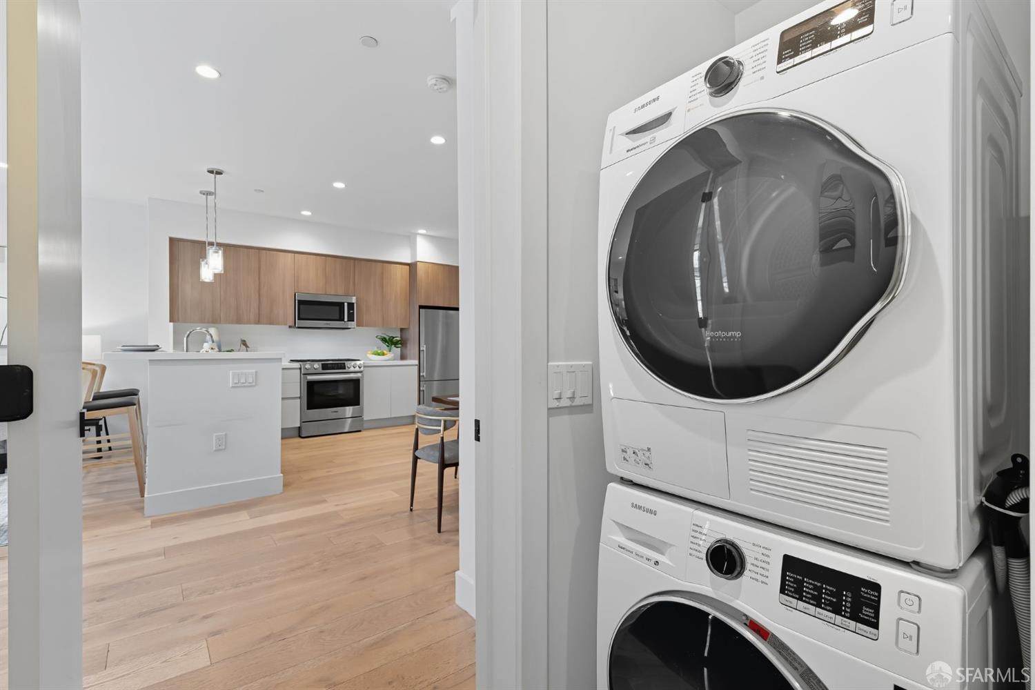 2747 San Pablo Avenue, Unit 406 Berkeley, CA 94702 - Photo 15 of 34 a view of a kitchen with washer and dryer
