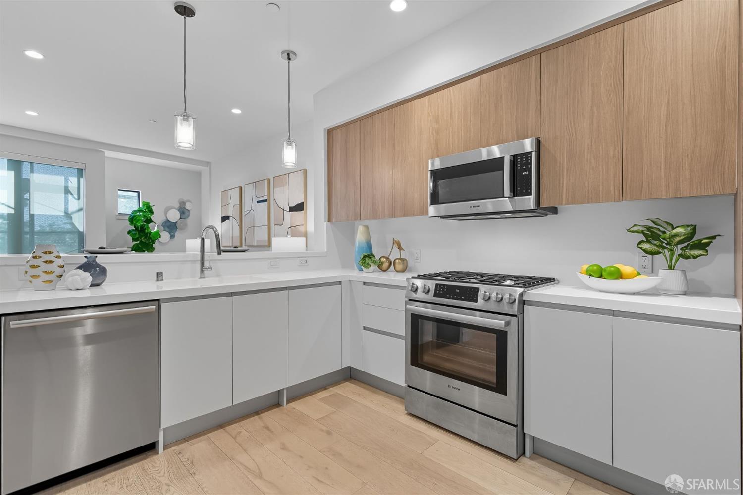 2747 San Pablo Avenue, Unit 406 Berkeley, CA 94702 - Photo 23 of 34 a kitchen with sink cabinets and stainless steel appliances