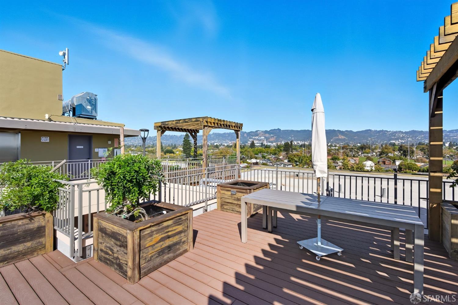 2747 San Pablo Avenue, Unit 406 Berkeley, CA 94702 - Photo 27 of 34 a view of balcony with seating space and potted plants