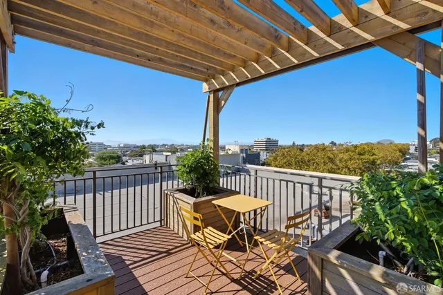 a view of a chairs on wooden deck