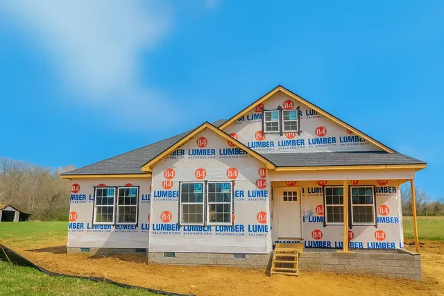 front view of a house with a yard