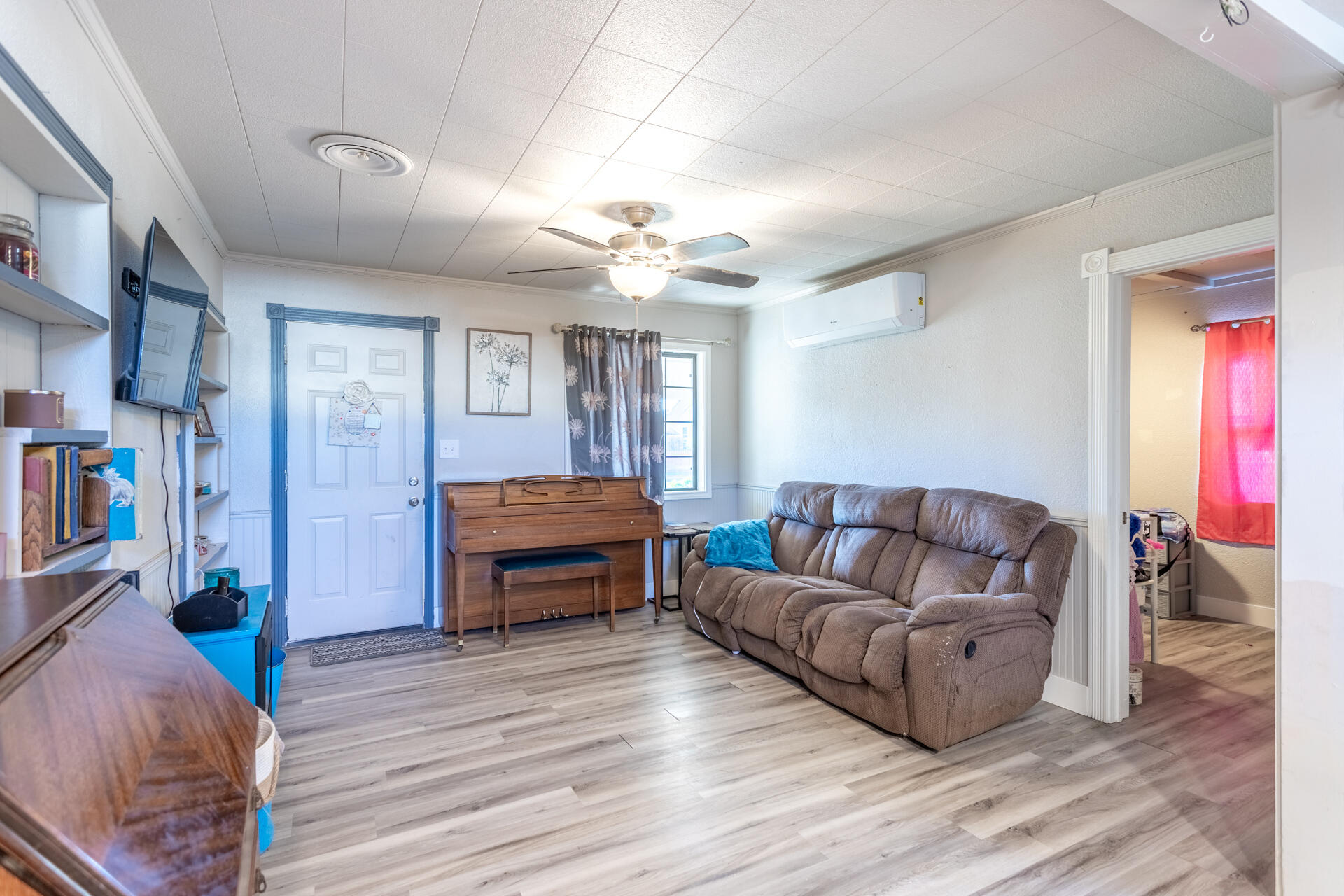 1012 State Street Redding, CA 96001 - Photo 13 of 27 a living room with furniture and a wooden floor