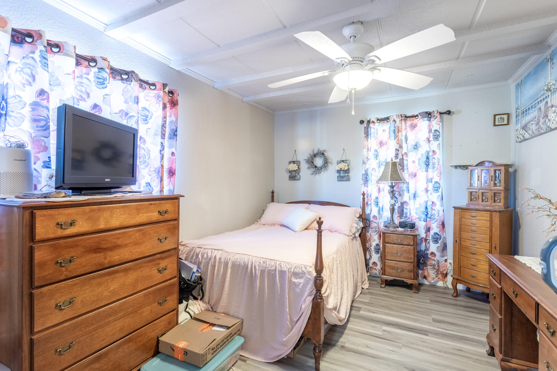 1012 State Street Redding, CA 96001 - Photo 15 of 27 a bedroom with a bed and a flat screen tv
