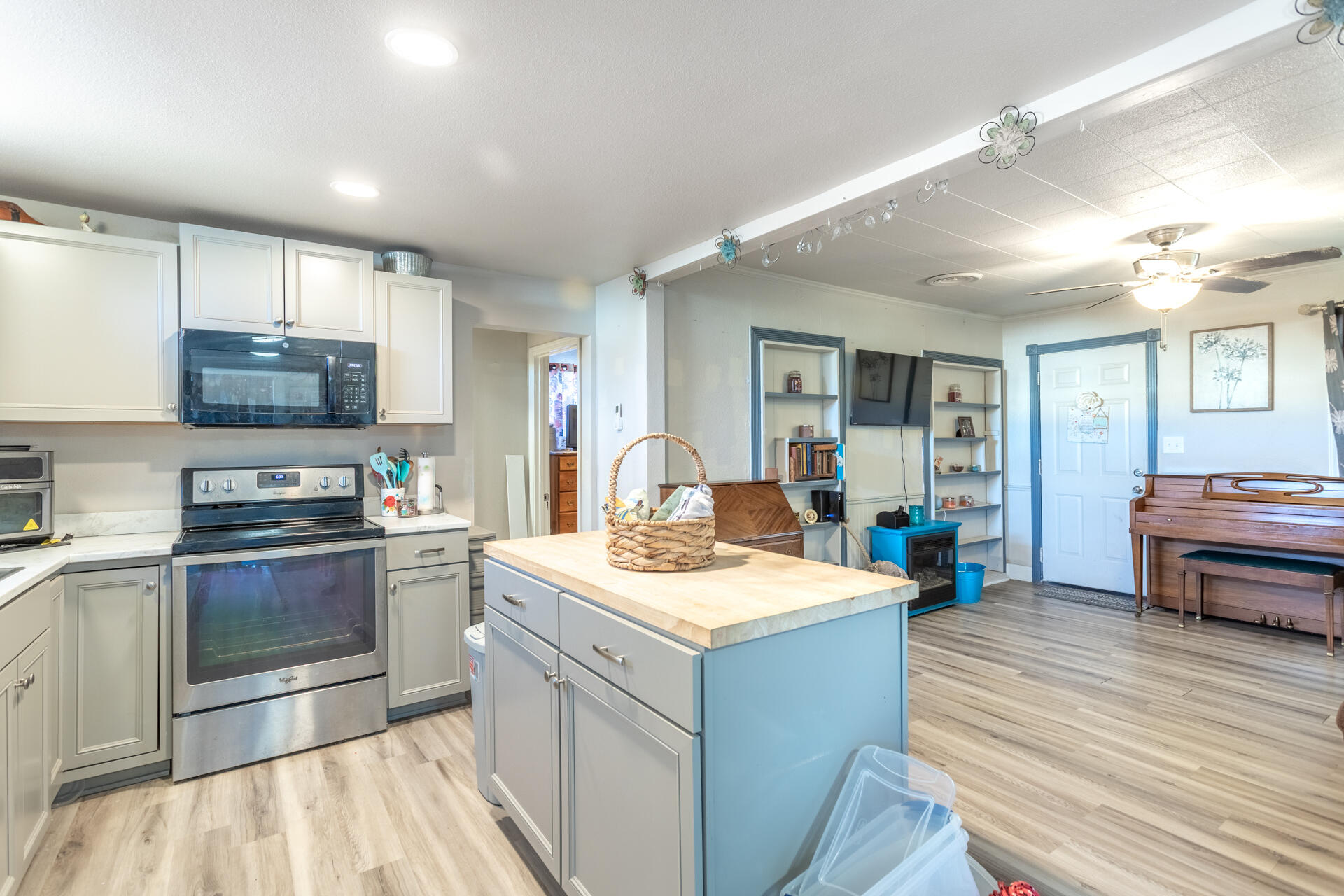 1012 State Street Redding, CA 96001 - Photo 18 of 27 a kitchen with stainless steel appliances granite countertop a sink stove and refrigerator