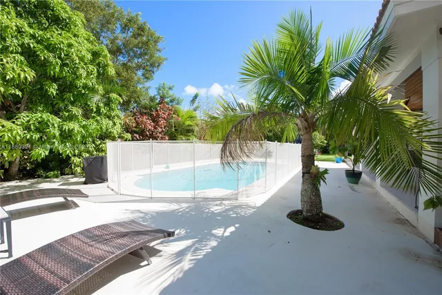 a house view with a garden space