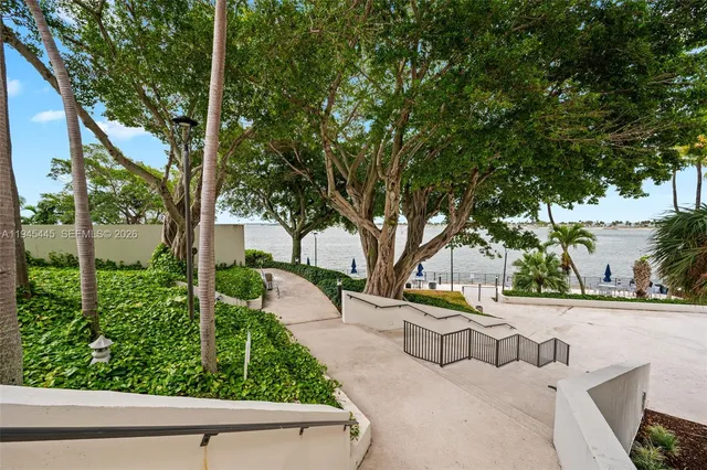 a view of a bench in a backyard