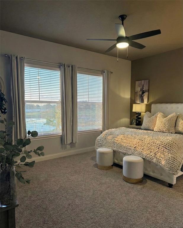 236 Caladium Avenue Lake Alfred, FL 33850 - Photo 23 of 58 a bedroom with a bed and a large window