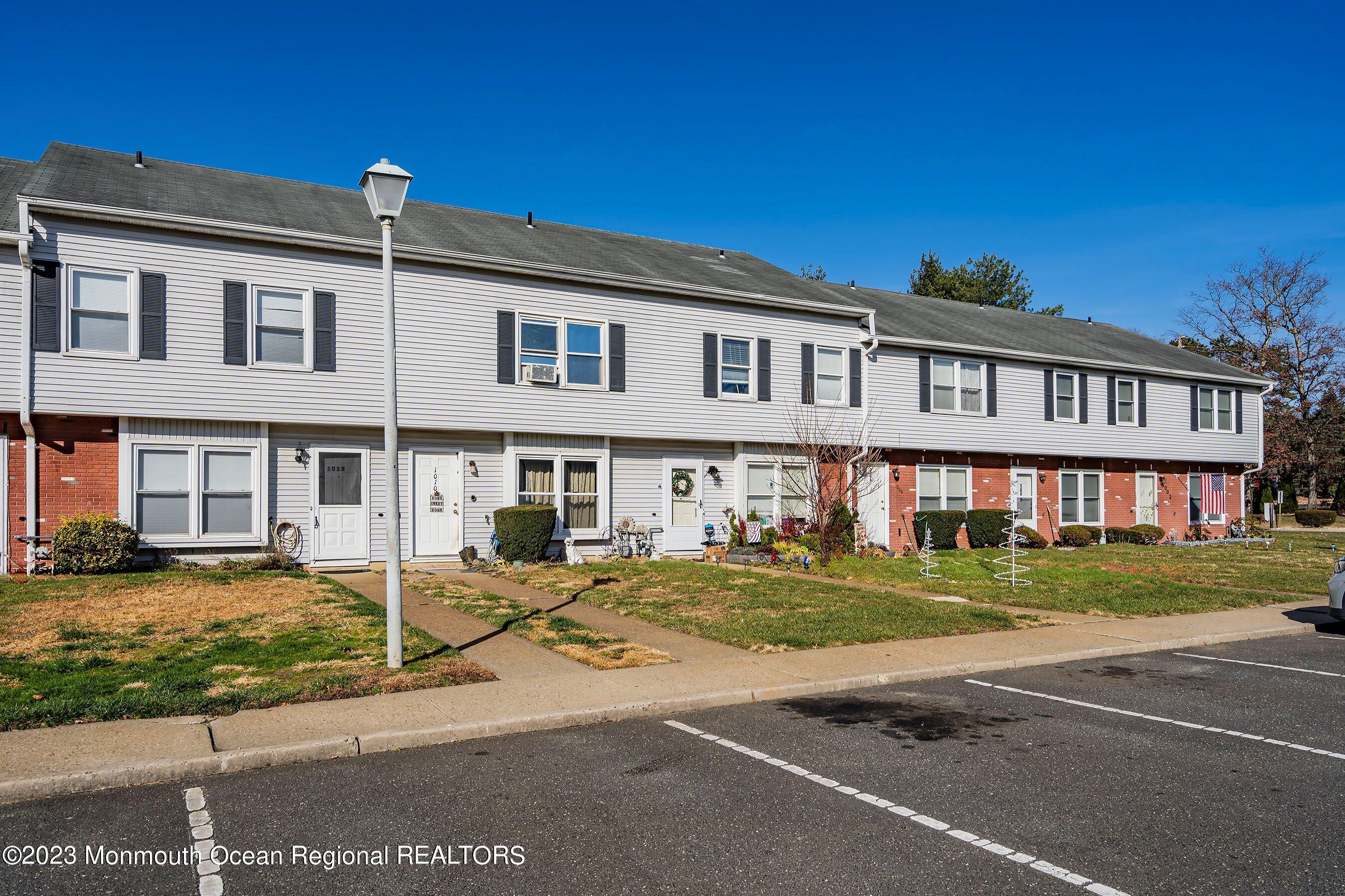 1012 Sawmill Road, Unit 6 Brick, NJ 08724 - Photo 2 of 24 a front view of a building with street view