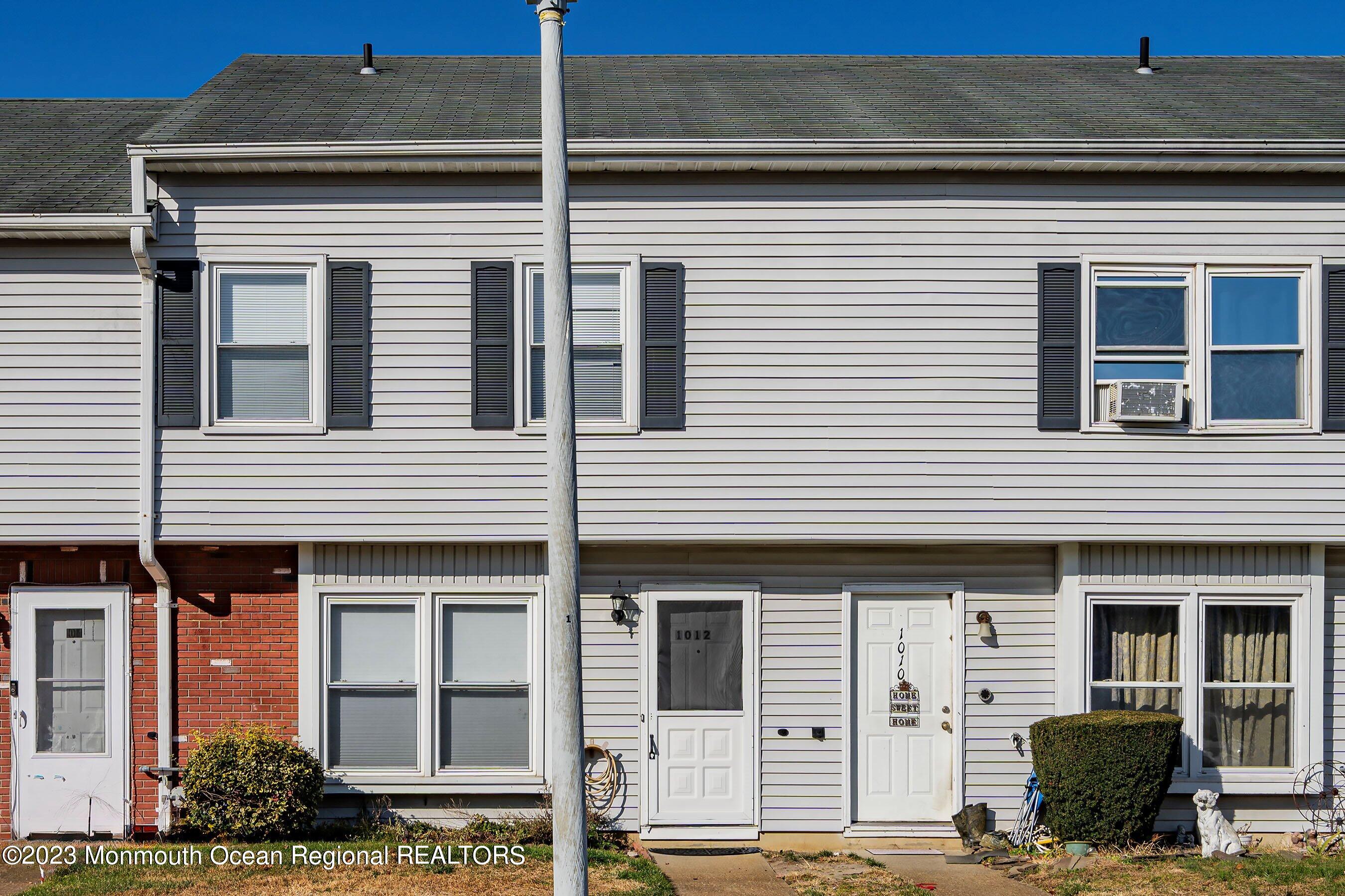 1012 Sawmill Road, Unit 6 Brick, NJ 08724 - Photo 3 of 24 a front view of a building with balcony