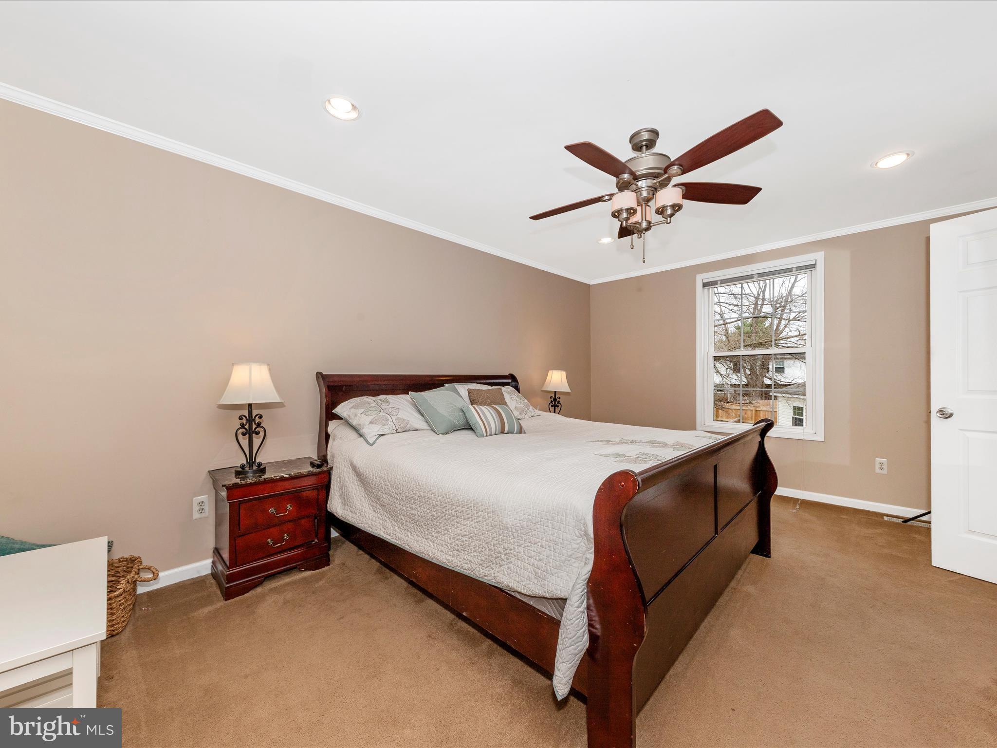 19005 Dowden Circle Poolesville, MD 20837 - Photo 19 of 51 a bedroom with a bed and window