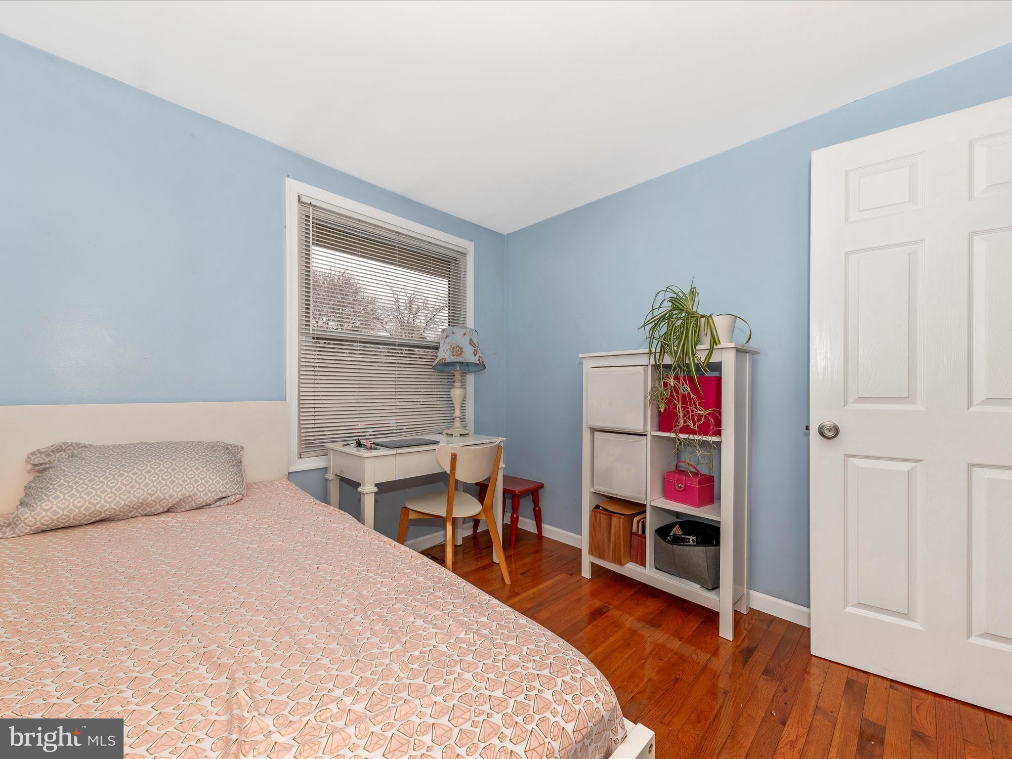 19005 Dowden Circle Poolesville, MD 20837 - Photo 28 of 51 a bedroom with a bed and wooden floor