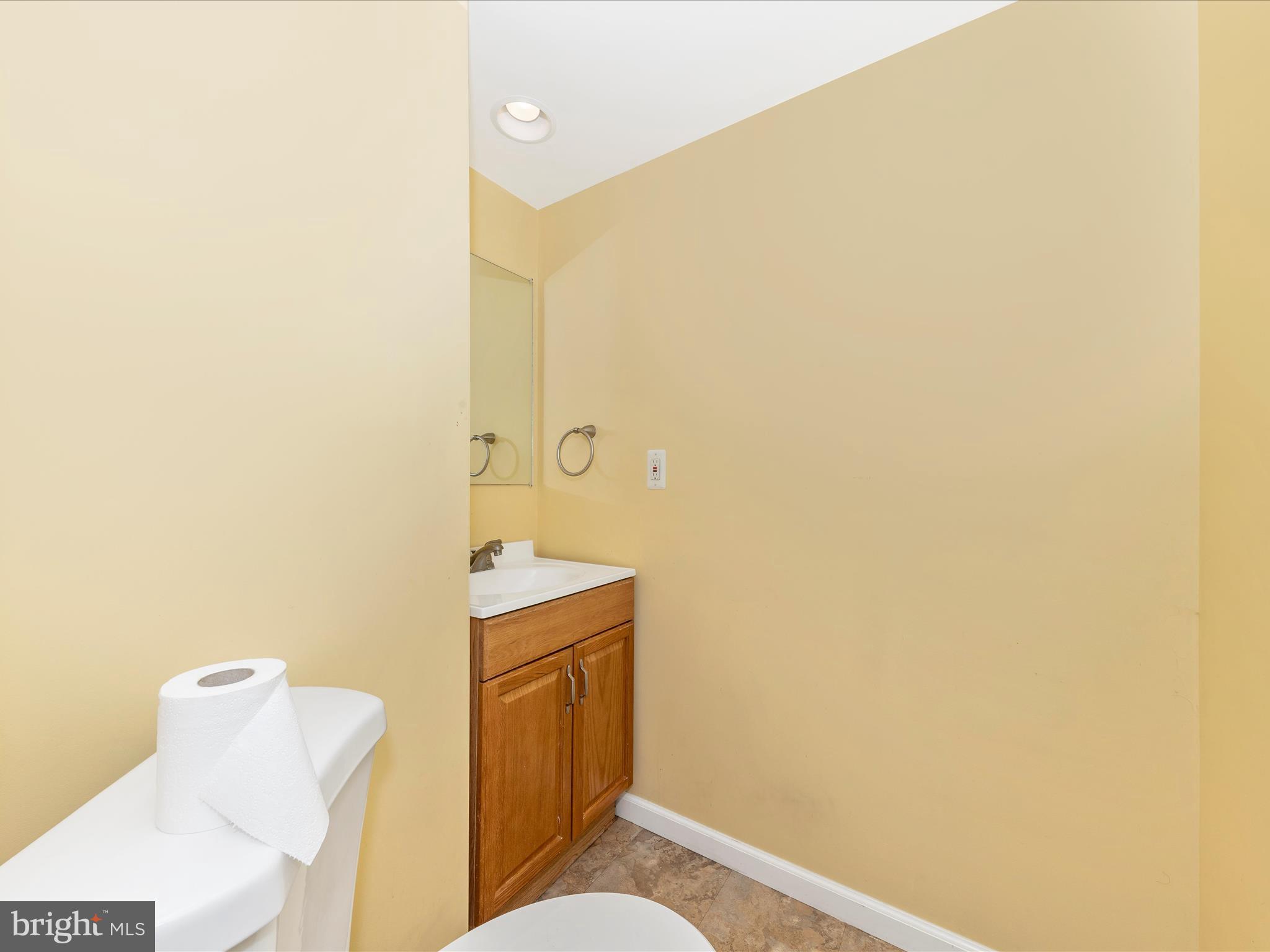 19005 Dowden Circle Poolesville, MD 20837 - Photo 35 of 51 a bathroom with a toilet and a sink