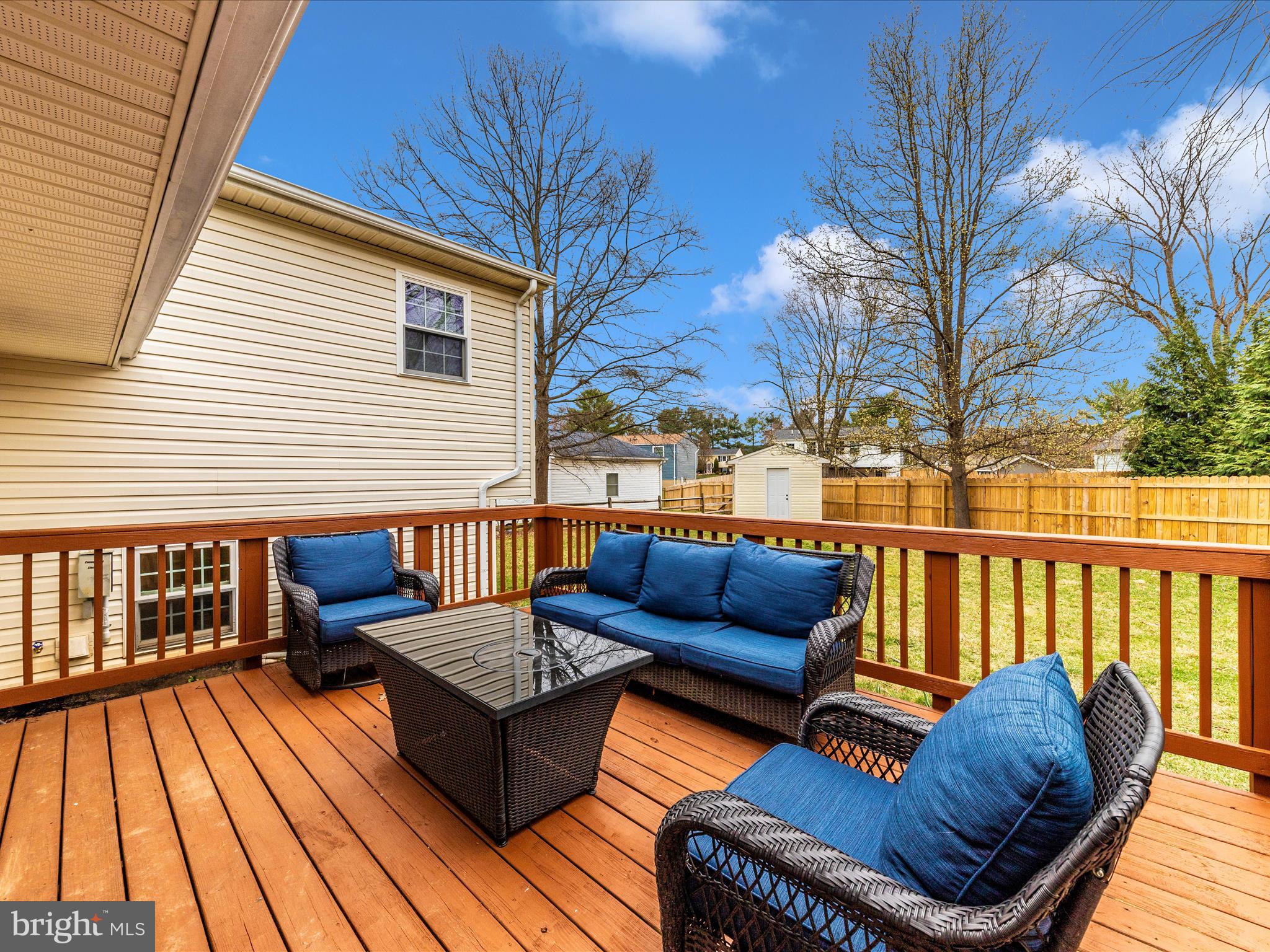 19005 Dowden Circle Poolesville, MD 20837 - Photo 48 of 51 a balcony with wooden floor and outdoor seating