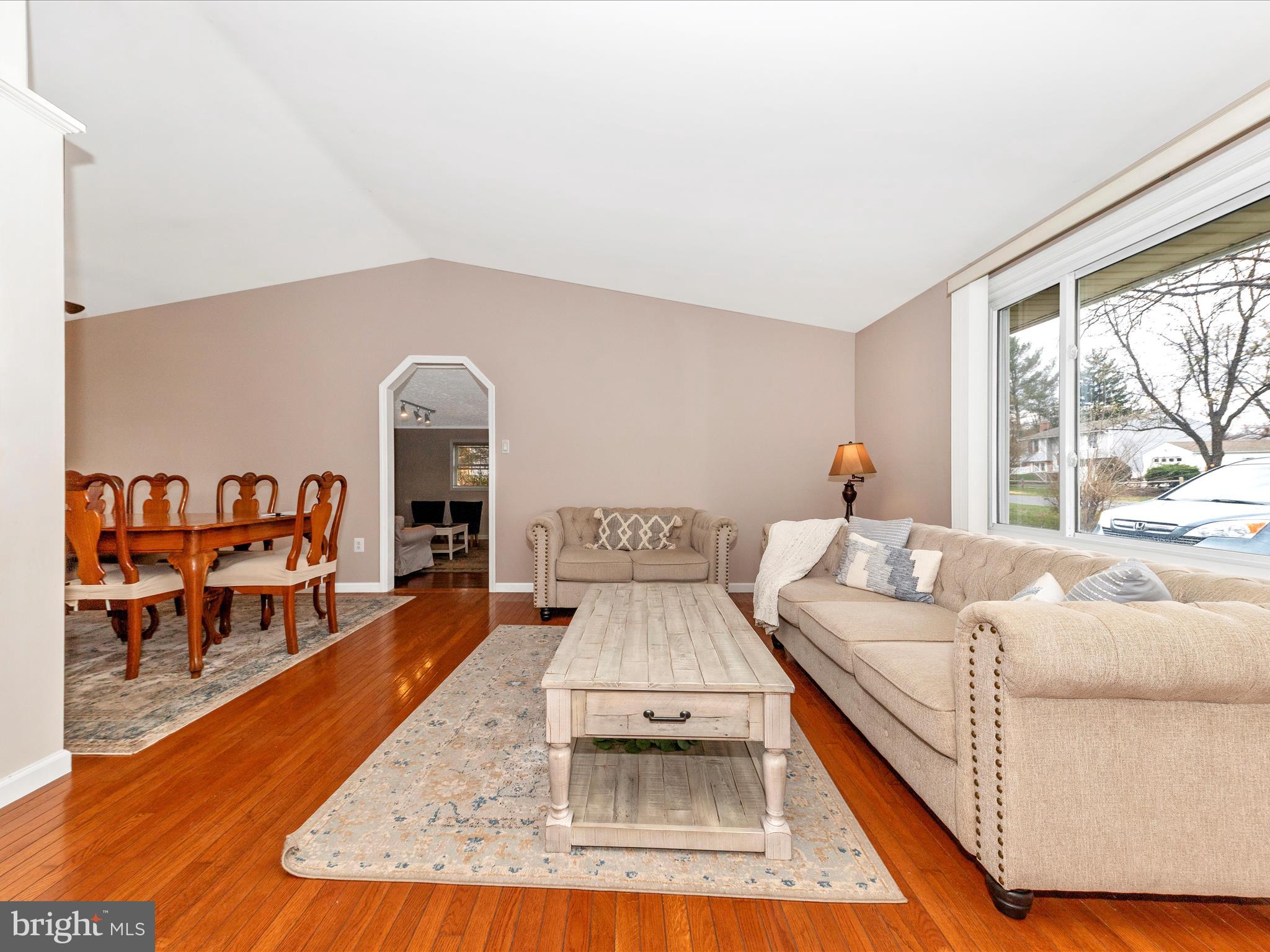 19005 Dowden Circle Poolesville, MD 20837 - Photo 5 of 51 a living room with furniture and a wooden floor