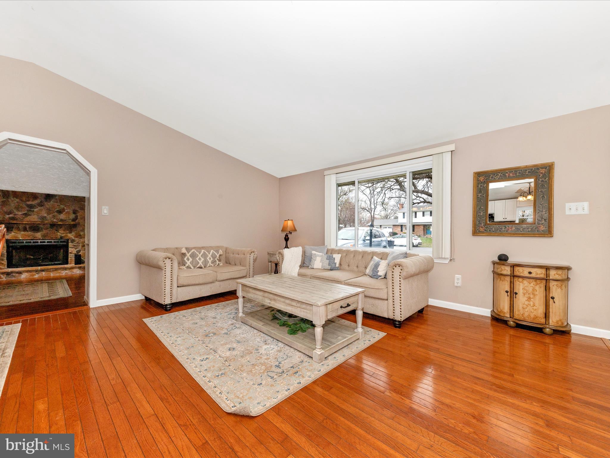 19005 Dowden Circle Poolesville, MD 20837 - Photo 6 of 51 a living room with furniture and a flat screen tv