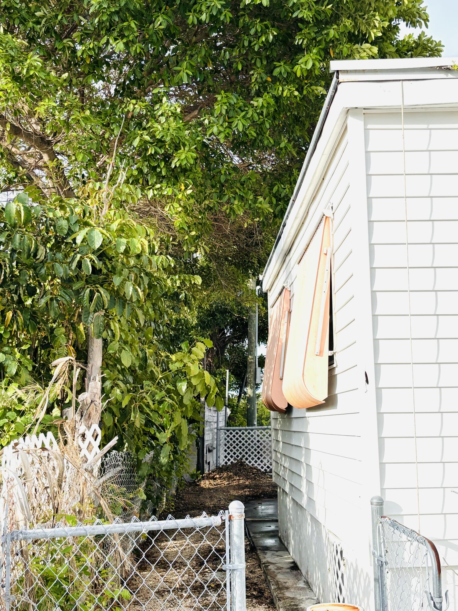 47 Boundary Lane Key West, FL 33040 - Photo 13 of 16 a view of house with backyard