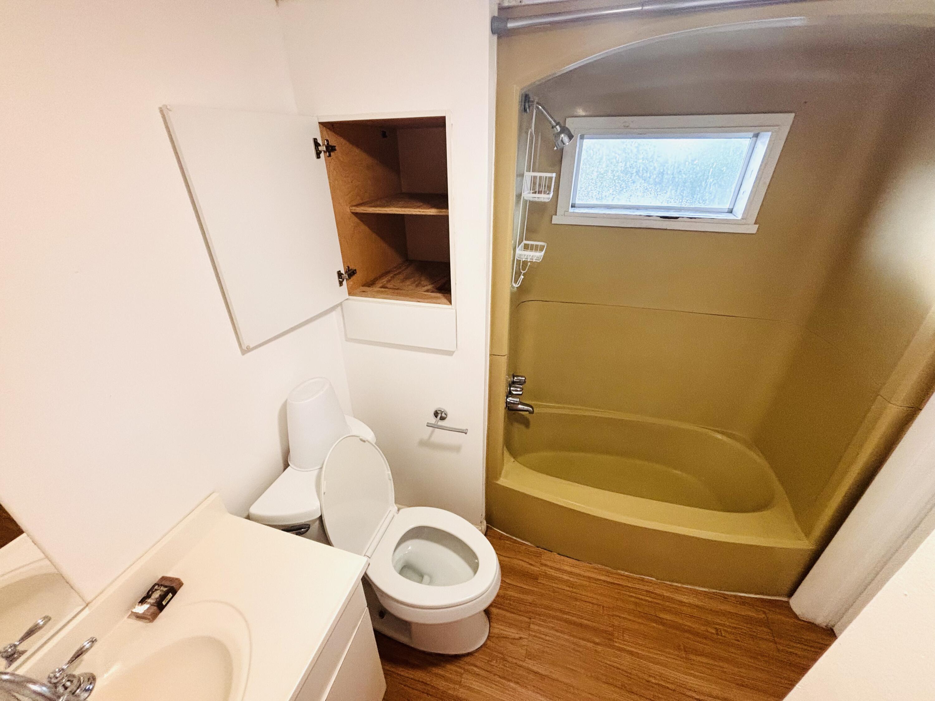47 Boundary Lane Key West, FL 33040 - Photo 7 of 16 a bathroom with a toilet and a shower