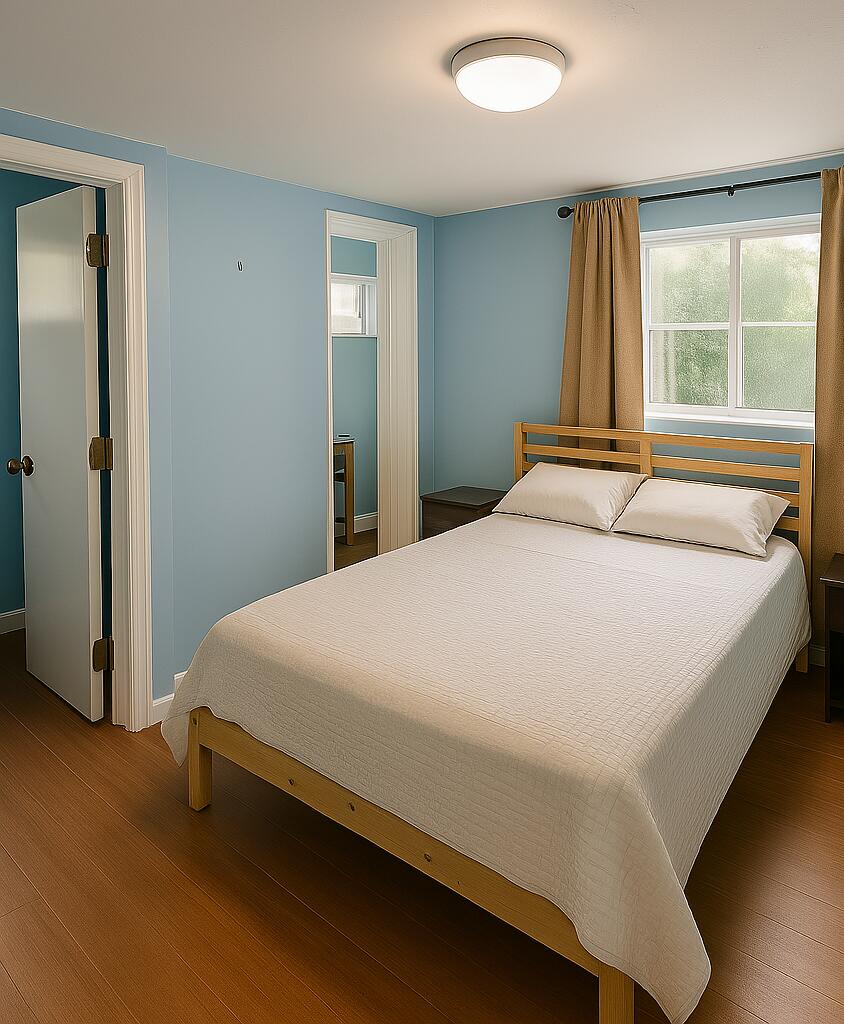 47 Boundary Lane Key West, FL 33040 - Photo 10 of 16 a bed sitting in a bedroom next to a window