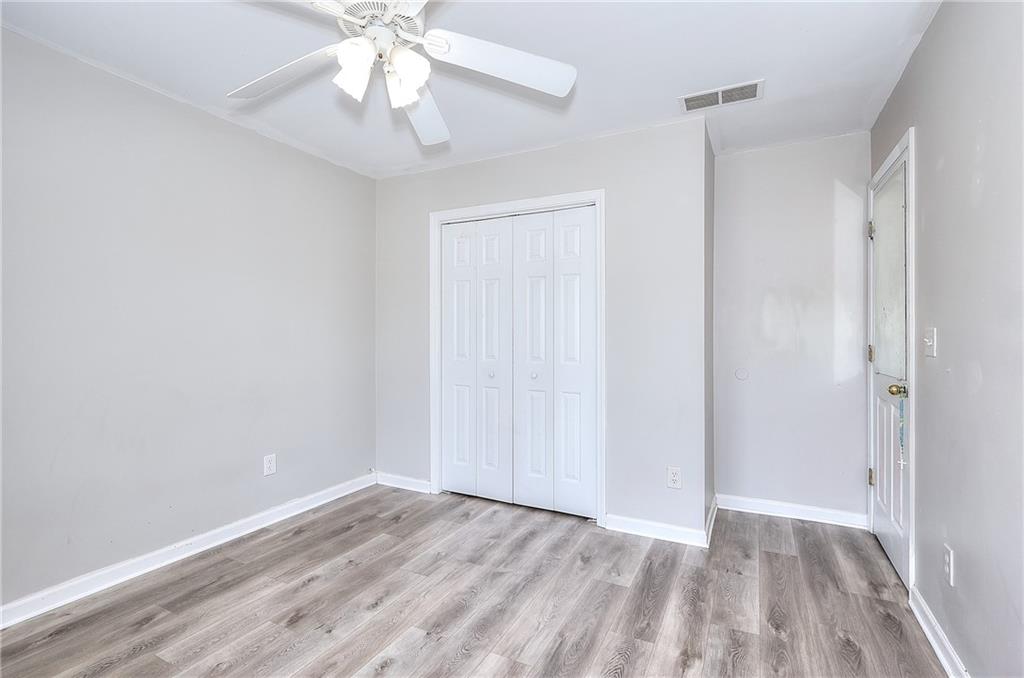 2520 Potomac View Court Grayson, GA 30017 - Photo 26 of 32 a view of an empty room with wooden floor