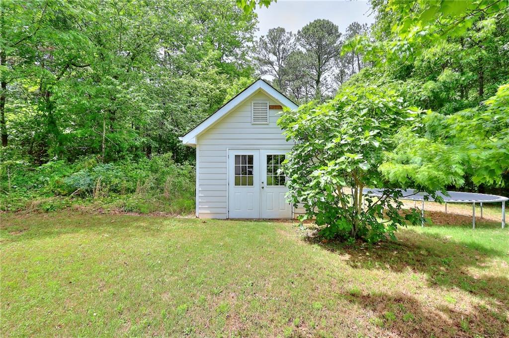 2520 Potomac View Court Grayson, GA 30017 - Photo 29 of 32 a view of a house with backyard and garden