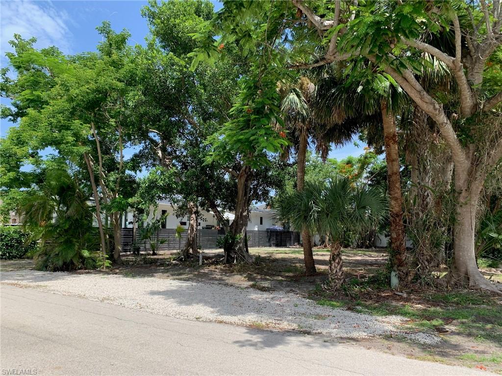 Carlton Avenue Naples, FL 34112 - Photo 15 of 22 a view of road with trees