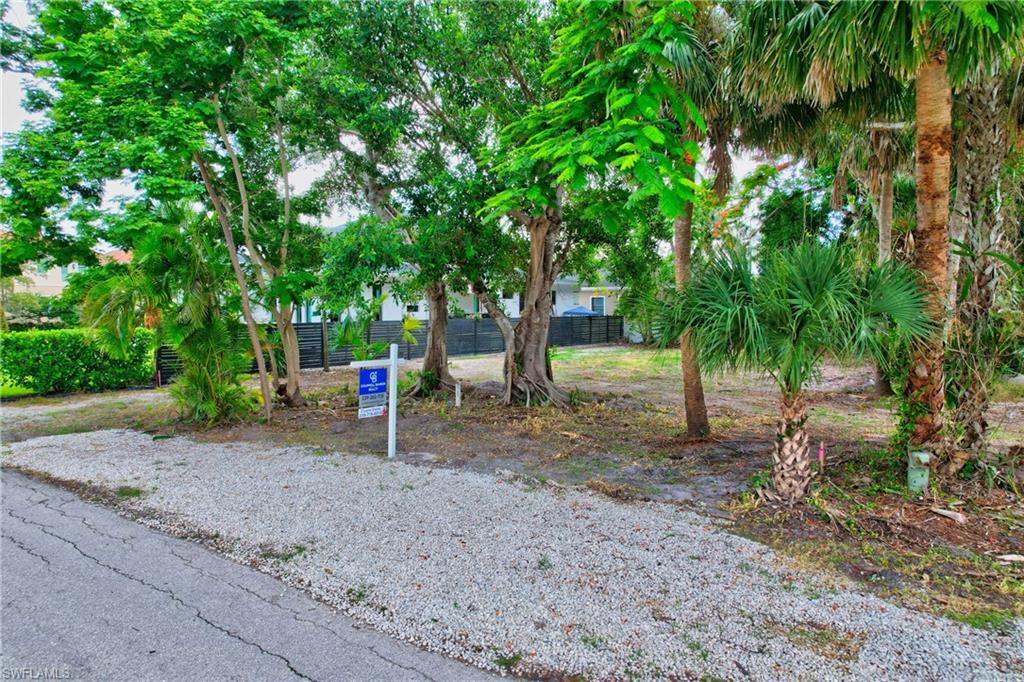 Carlton Avenue Naples, FL 34112 - Photo 2 of 22 a view of a park with large trees