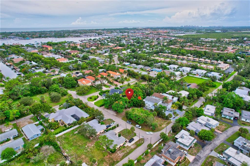 Carlton Avenue Naples, FL 34112 - Photo 5 of 22 an aerial view of residential houses with outdoor space and trees