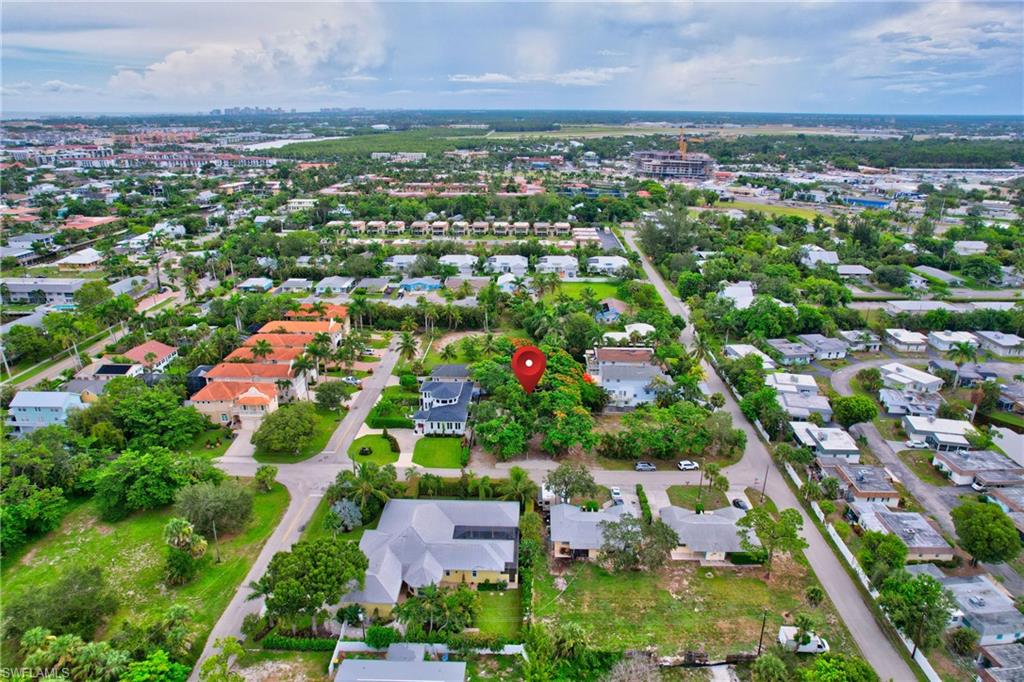 Carlton Avenue Naples, FL 34112 - Photo 8 of 22 an aerial view of residential houses with outdoor space and trees