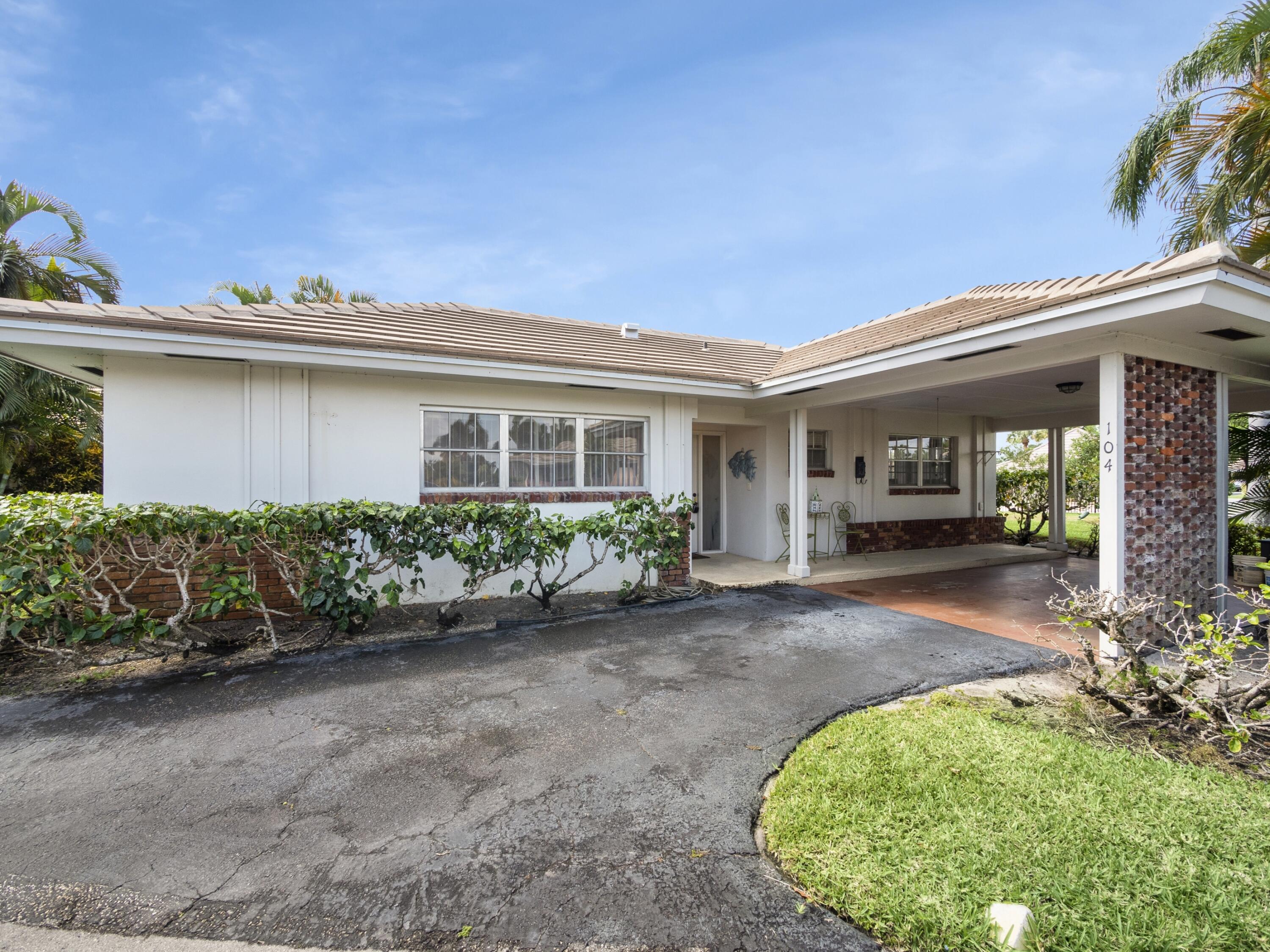 104 Villa Circle, Atlantis, FL 33462 Compass