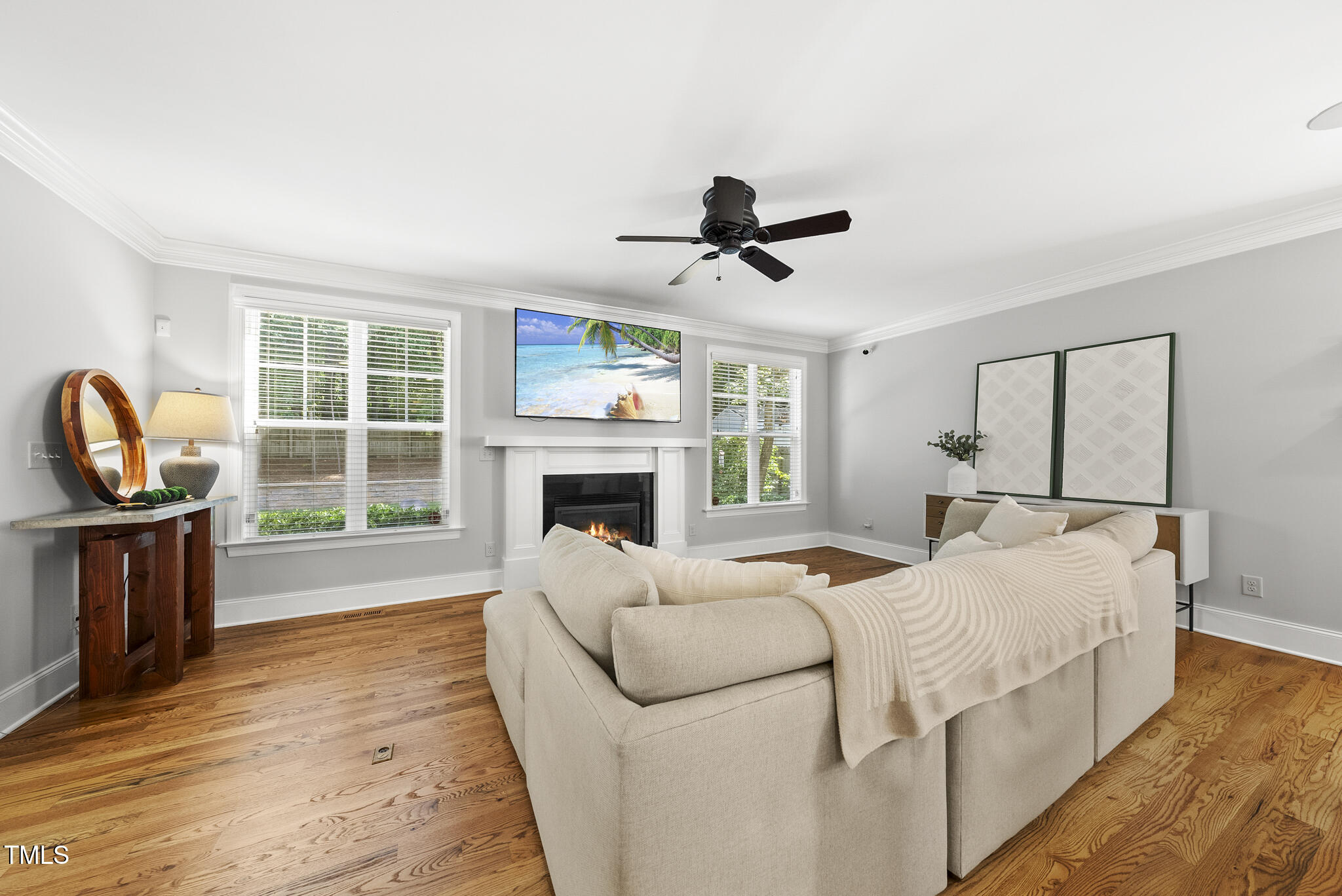 2216 Gresham Lake Road Raleigh, NC 27615 - Photo 26 of 52 a bed room with a bed and a fireplace