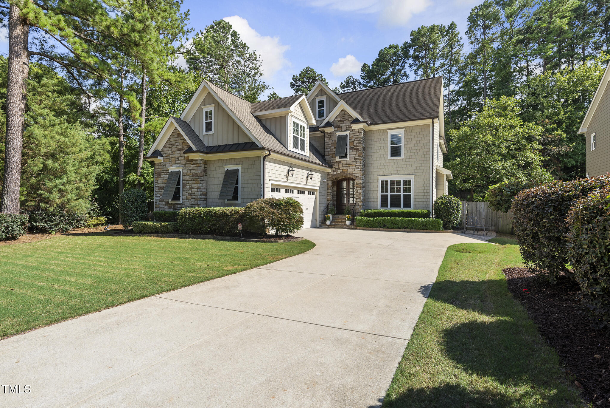 2216 Gresham Lake Road Raleigh, NC 27615 - Photo 2 of 52 front view of house with a yard