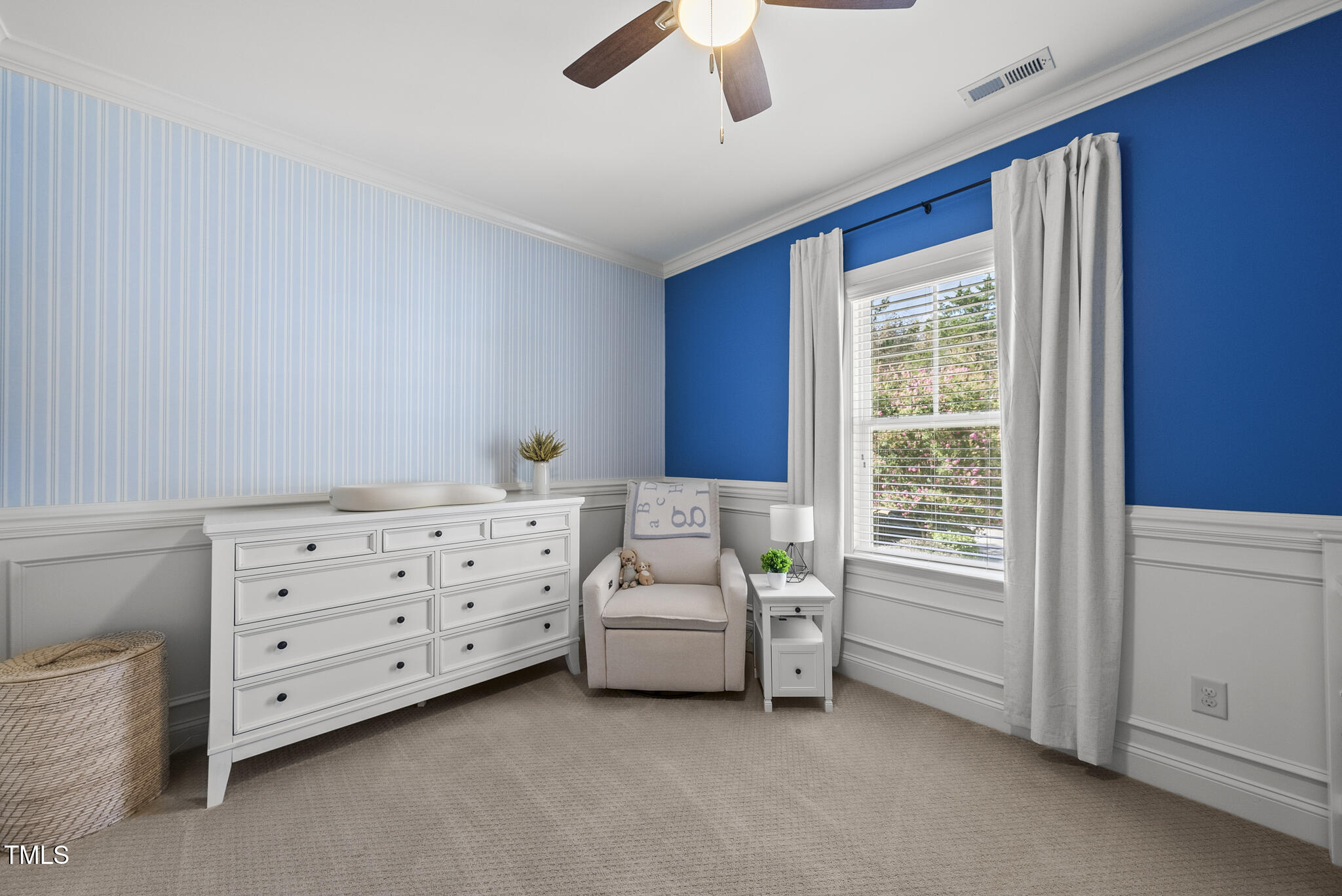 2216 Gresham Lake Road Raleigh, NC 27615 - Photo 36 of 52 a bed room with a bed and a window