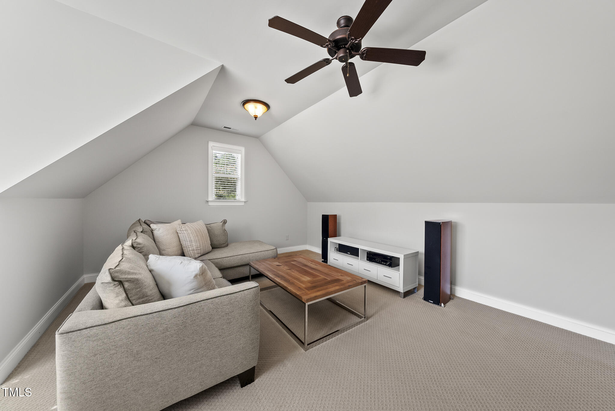 2216 Gresham Lake Road Raleigh, NC 27615 - Photo 43 of 52 a living room with furniture and a window