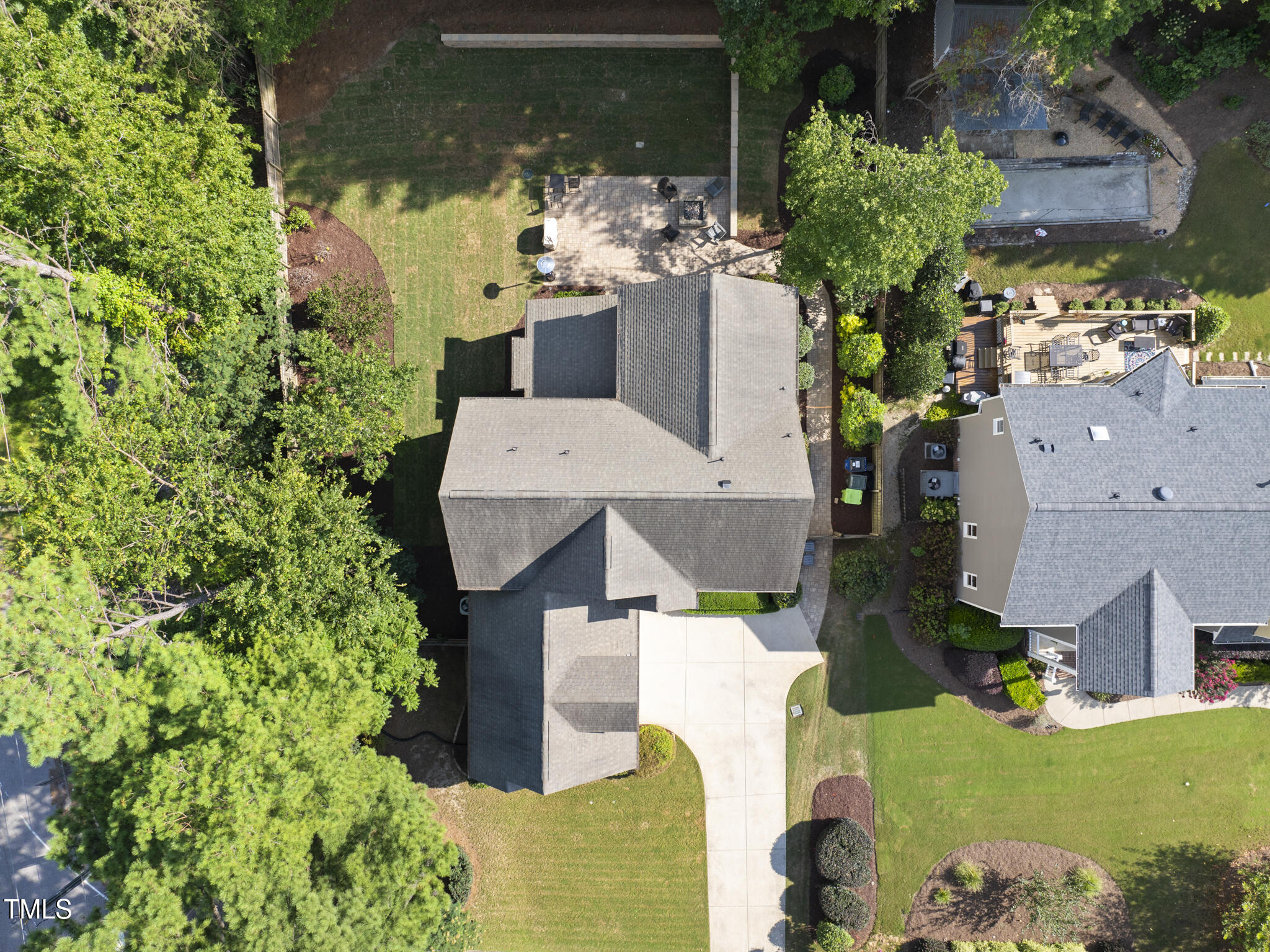 2216 Gresham Lake Road Raleigh, NC 27615 - Photo 4 of 52 an aerial view of a house with a yard swimming pool and outdoor seating
