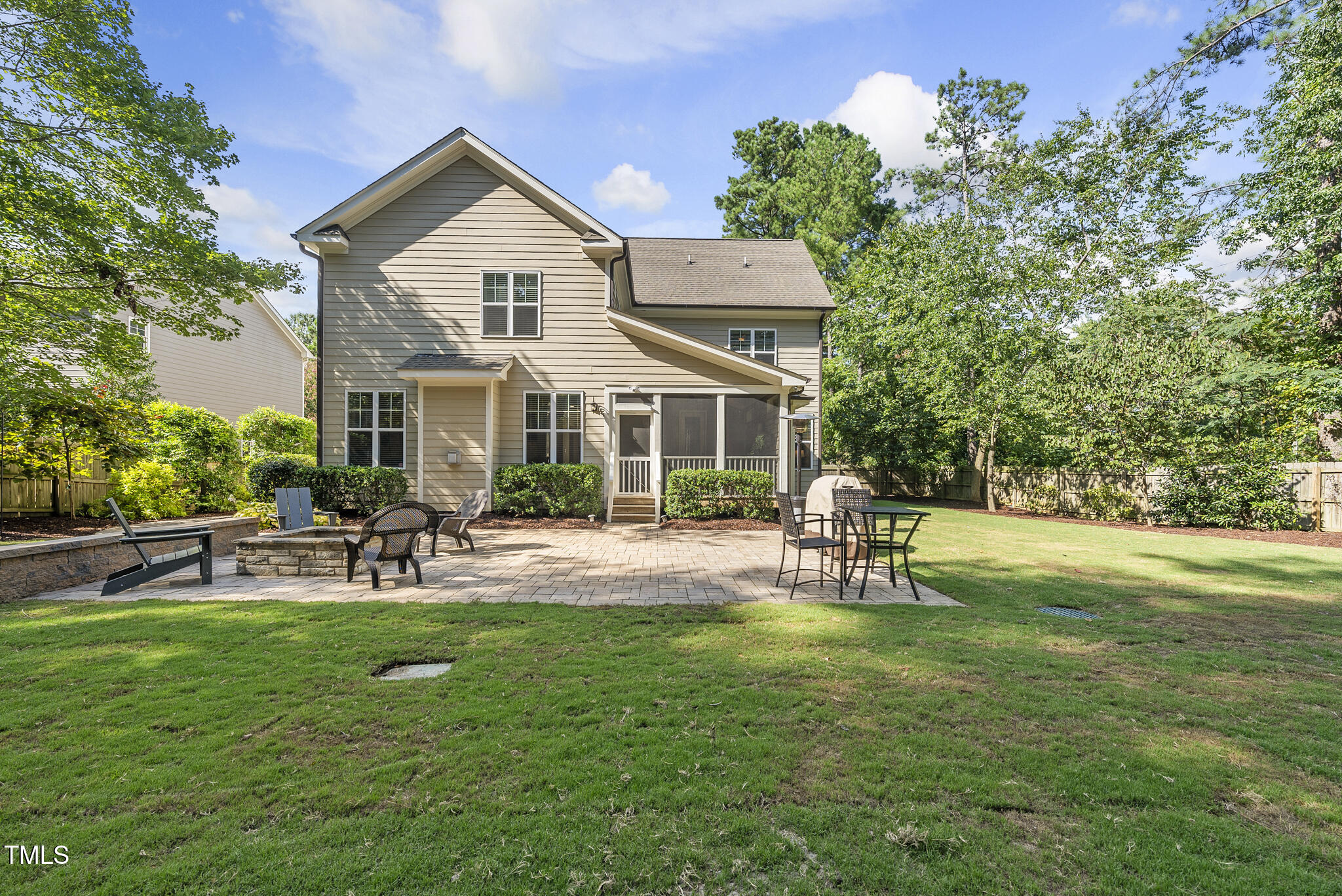 2216 Gresham Lake Road Raleigh, NC 27615 - Photo 5 of 52 a house view with a sitting space and garden