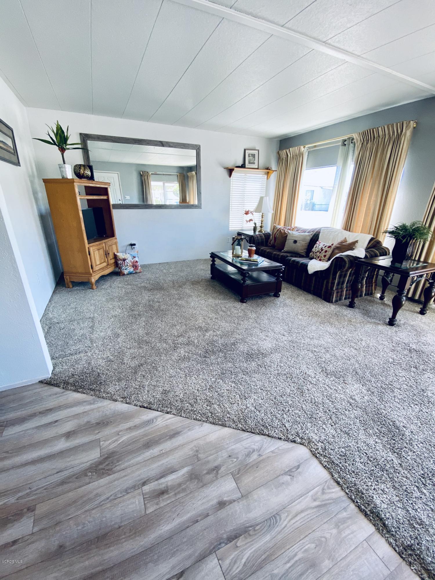15433 West Telegraph Road, Unit 4 Santa Paula, CA 93060 - Photo 13 of 52 a living room with furniture and a window
