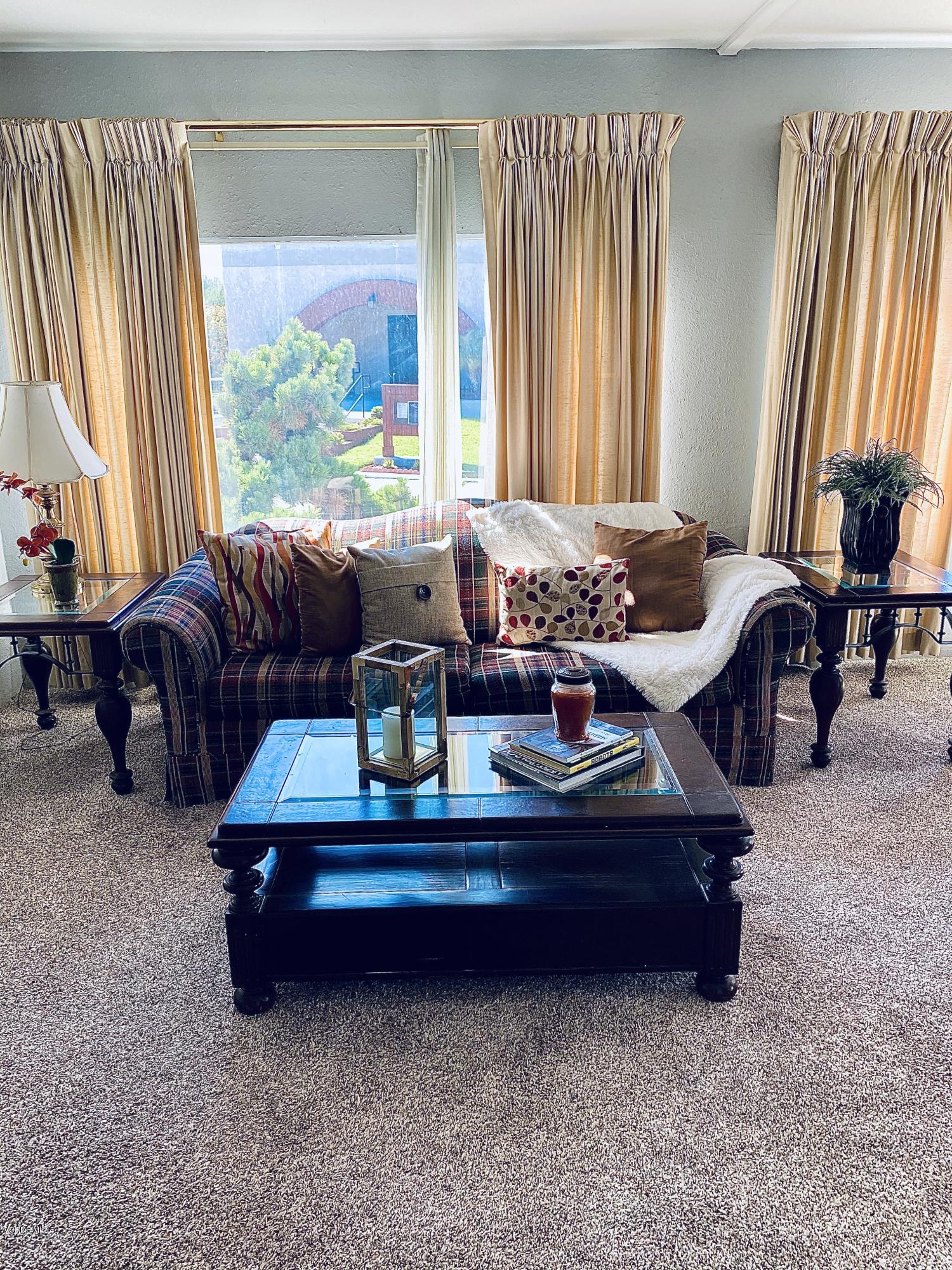 15433 West Telegraph Road, Unit 4 Santa Paula, CA 93060 - Photo 15 of 52 a living room with furniture and a large window