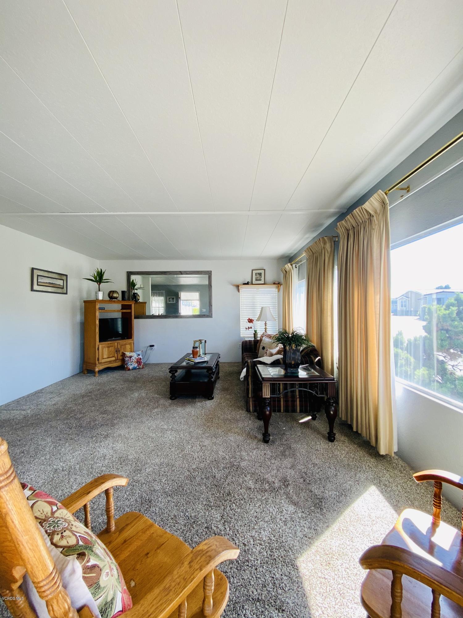 15433 West Telegraph Road, Unit 4 Santa Paula, CA 93060 - Photo 16 of 52 a living room with furniture and a window