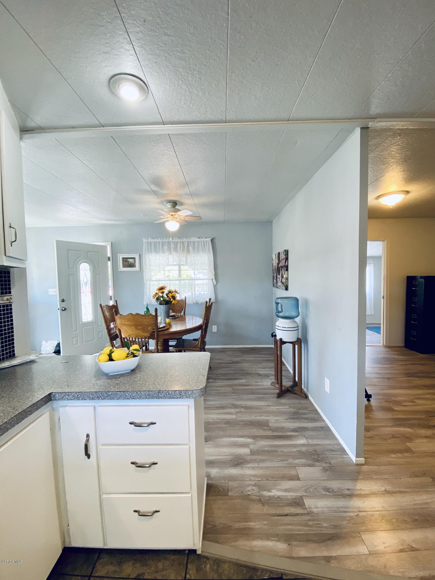 15433 West Telegraph Road, Unit 4 Santa Paula, CA 93060 - Photo 22 of 52 a view of a room with furniture and wooden floor