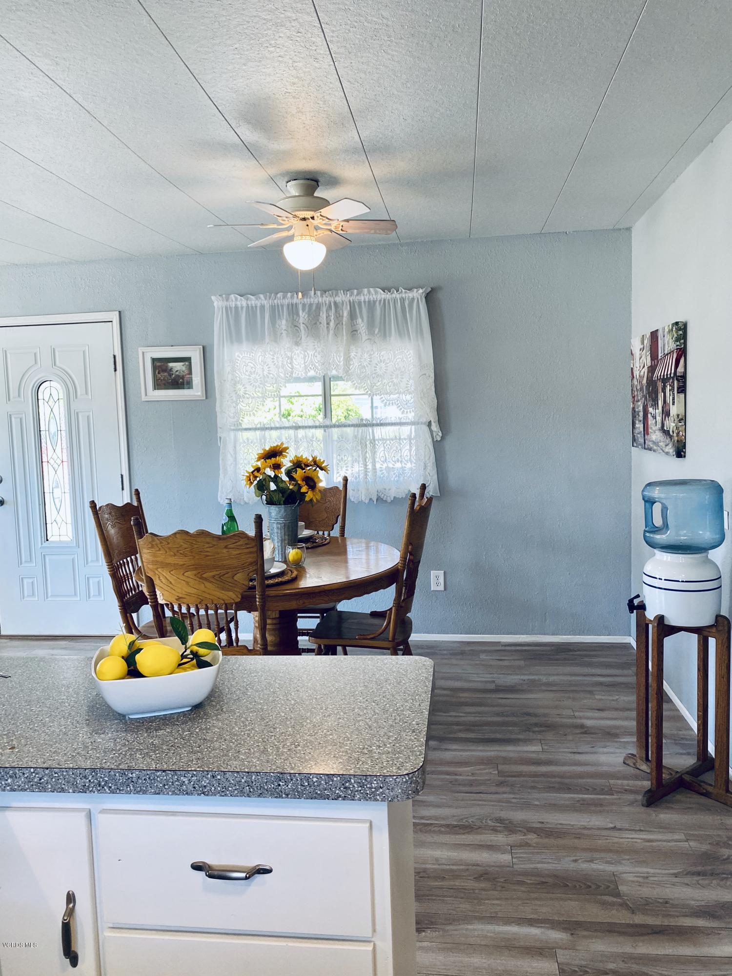 15433 West Telegraph Road, Unit 4 Santa Paula, CA 93060 - Photo 23 of 52 a view of dining room and wooden floor