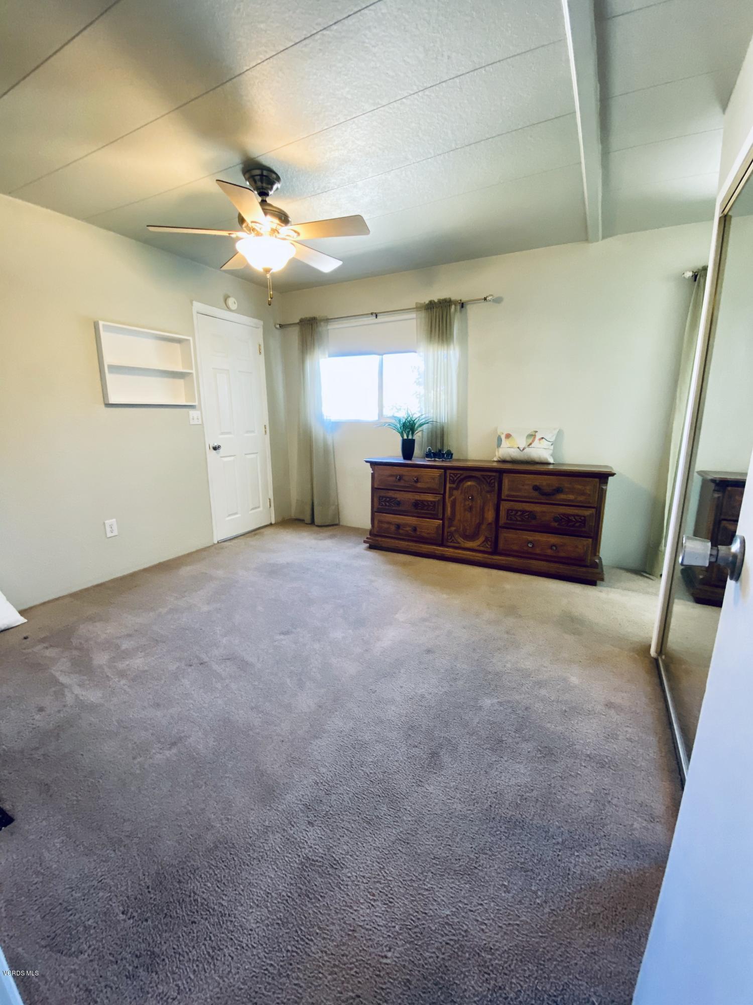 15433 West Telegraph Road, Unit 4 Santa Paula, CA 93060 - Photo 35 of 52 a view of workspace with window and a ceiling fan