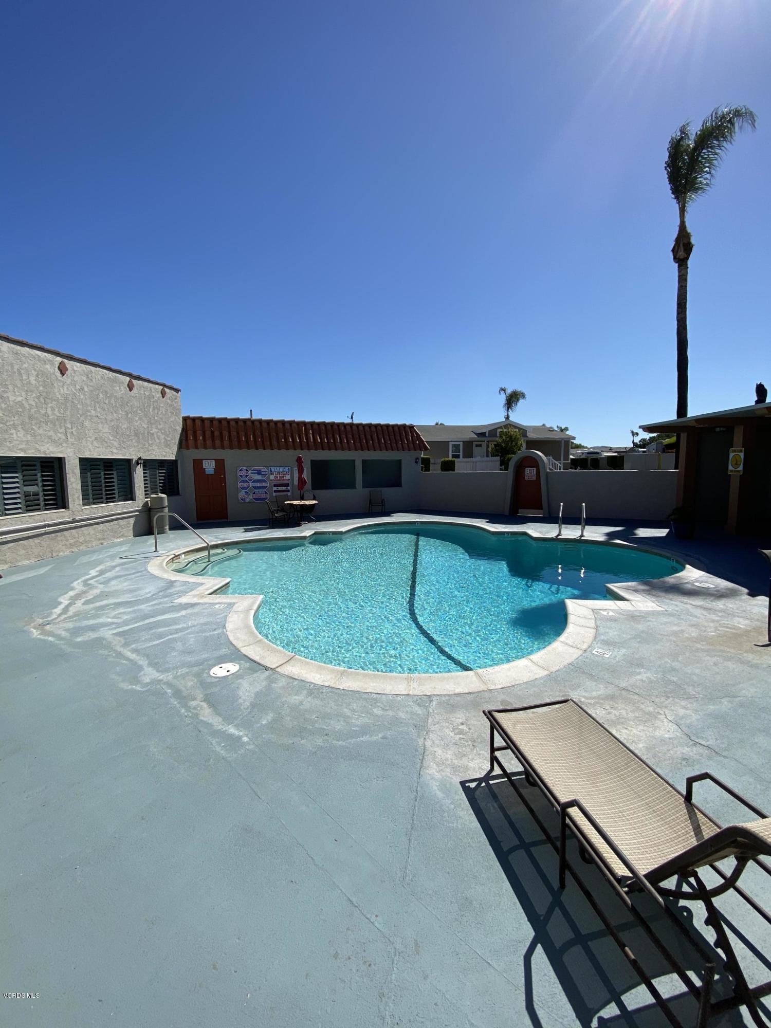 15433 West Telegraph Road, Unit 4 Santa Paula, CA 93060 - Photo 49 of 52 a view of a swimming pool with a chair