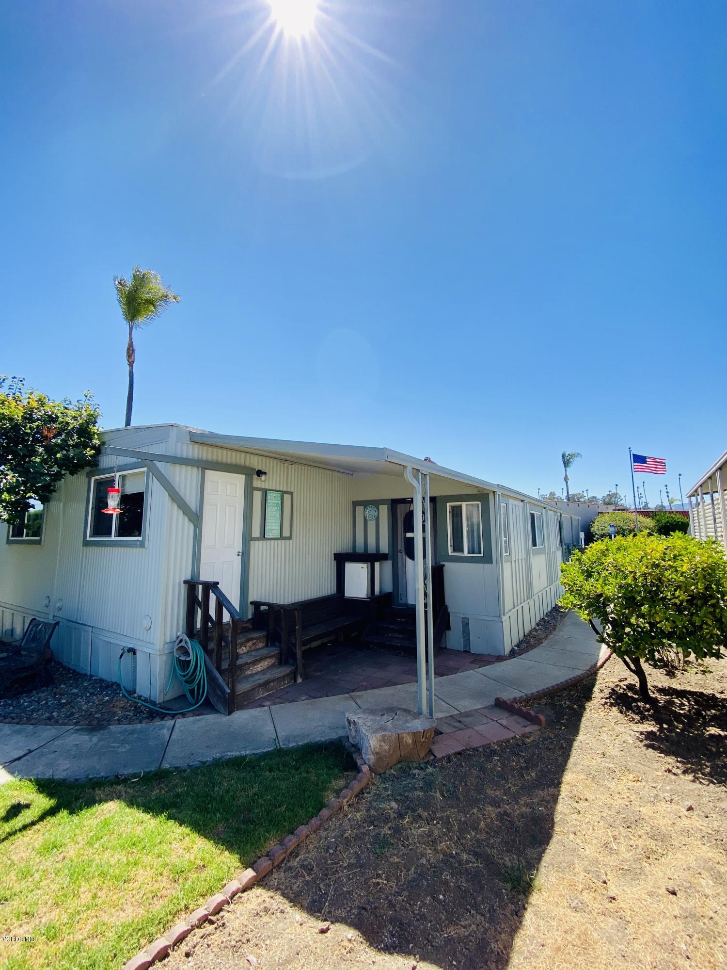 15433 West Telegraph Road, Unit 4 Santa Paula, CA 93060 - Photo 9 of 52 a front view of a house with garden