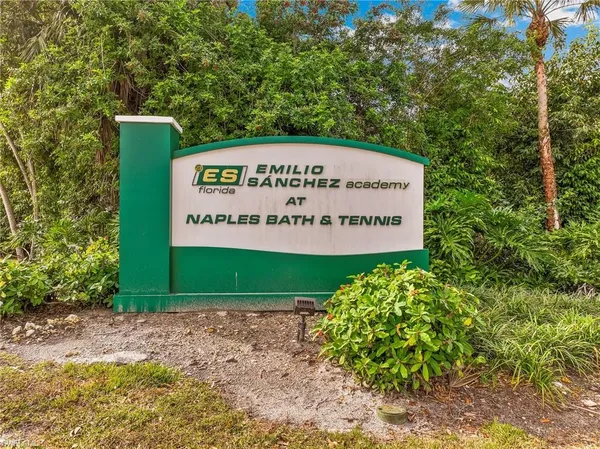 a sign on the side of a road