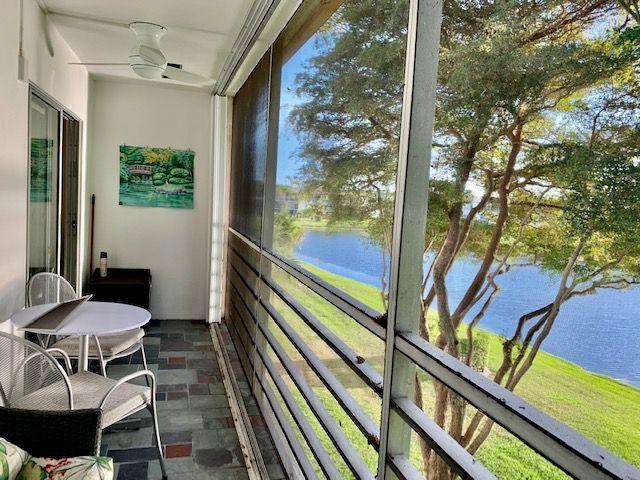 206 Brighton East Boca Raton, FL 33434 - Photo 15 of 29 Screened Patio w/Lake View