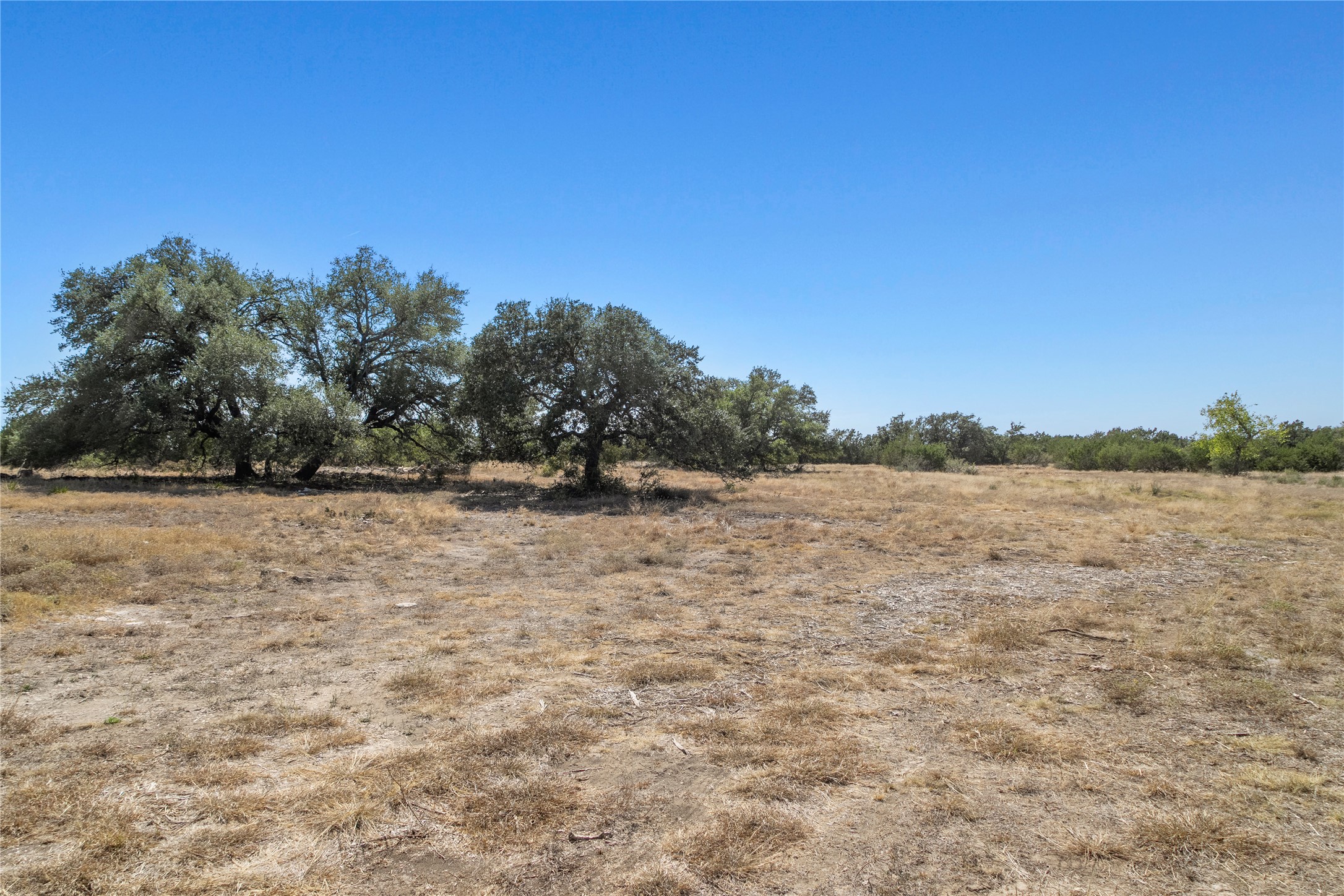 219 Canyon Road Johnson City, TX 78636 - Photo 1 of 9 a view of lake view and mountain view
