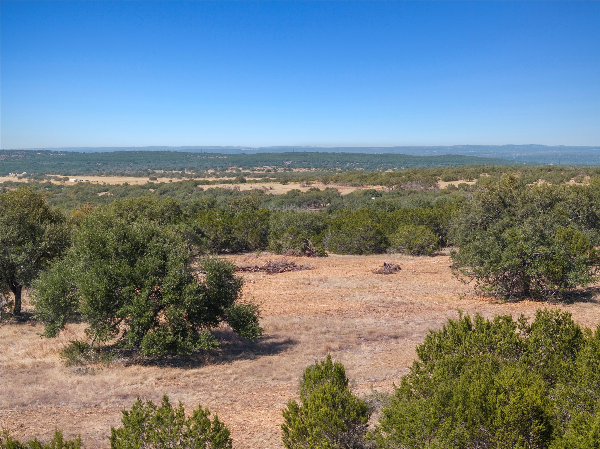 219 Canyon Road Johnson City, TX 78636 - Photo 3 of 9 a view of a yard with an ocean